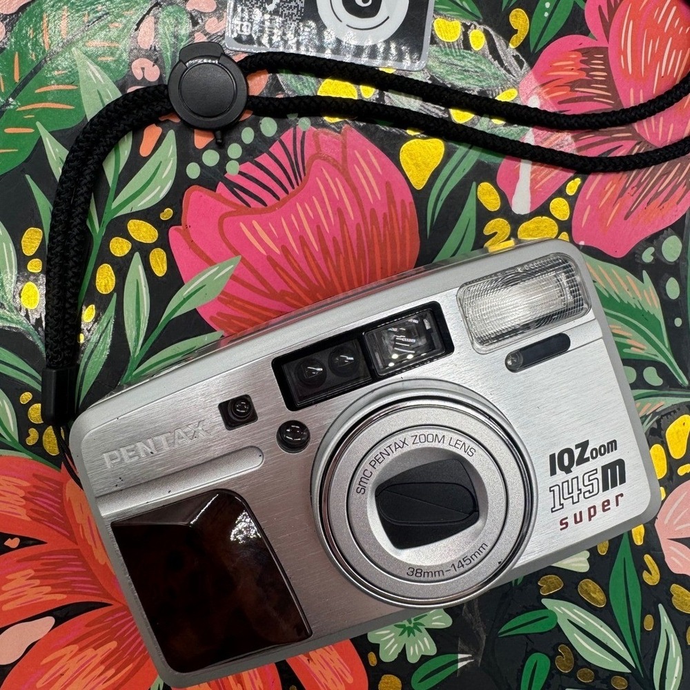 Pentax IQZoom 145m Super 35mm Film Camera 38-145mm Zoom Lens Case Strap Battery